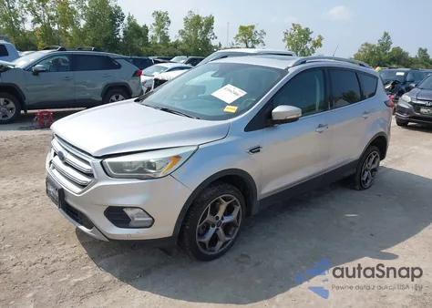 2019 Ford Escape Titanium z USA, uszkodzony, nr VIN 1FMCU9J94KUB23522